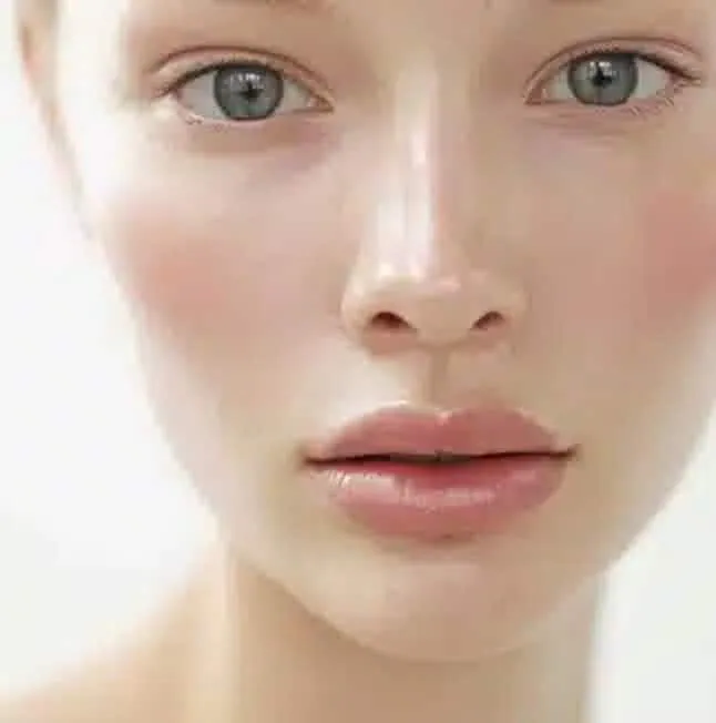 Close view of a woman's face with smooth, even-toned skin