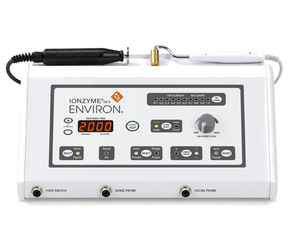 The Environ Ionzyme DF II machine, with its sonic and facial probes resting on the console
