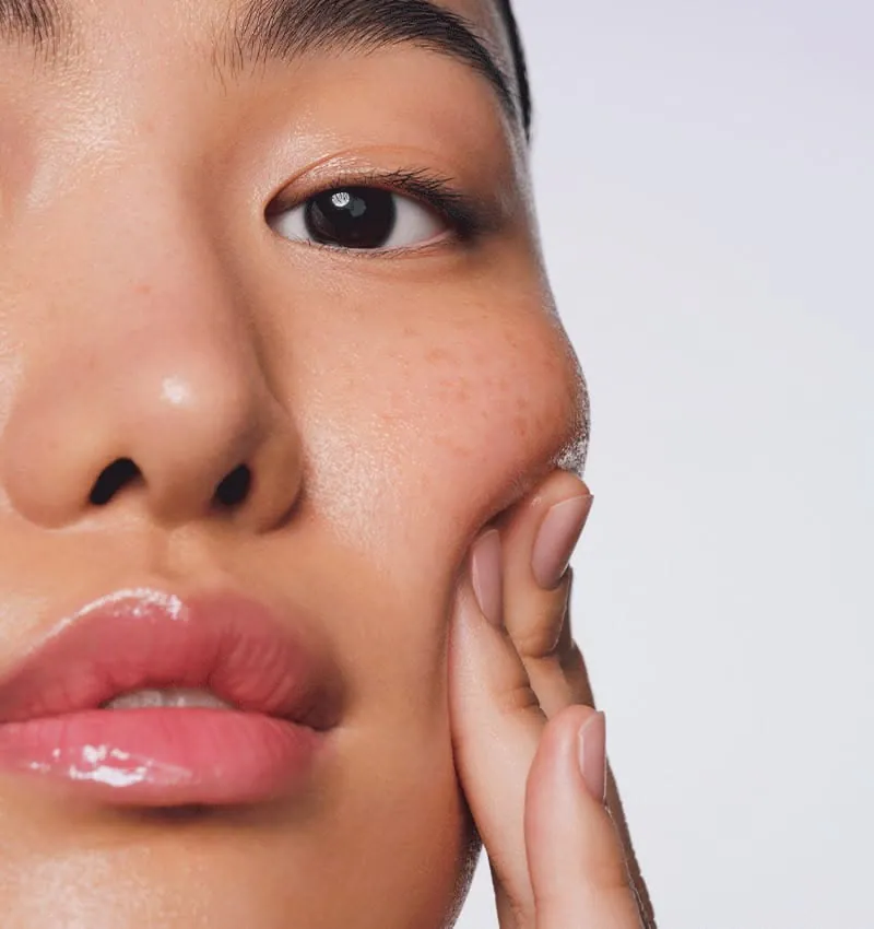Half-face portrait showing cheek pigmentation and even skin tone