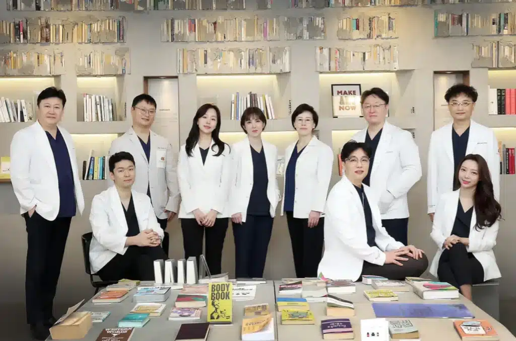 Group of Korean facial professionals taking a photo